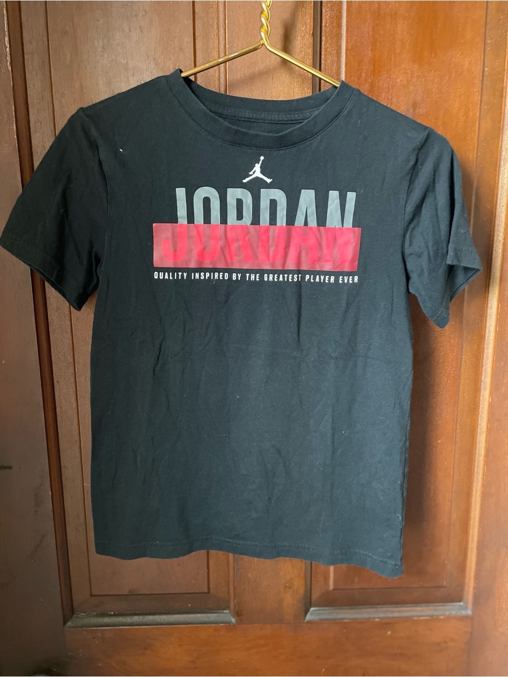 Jordan boys size large short sleeve black shirt
